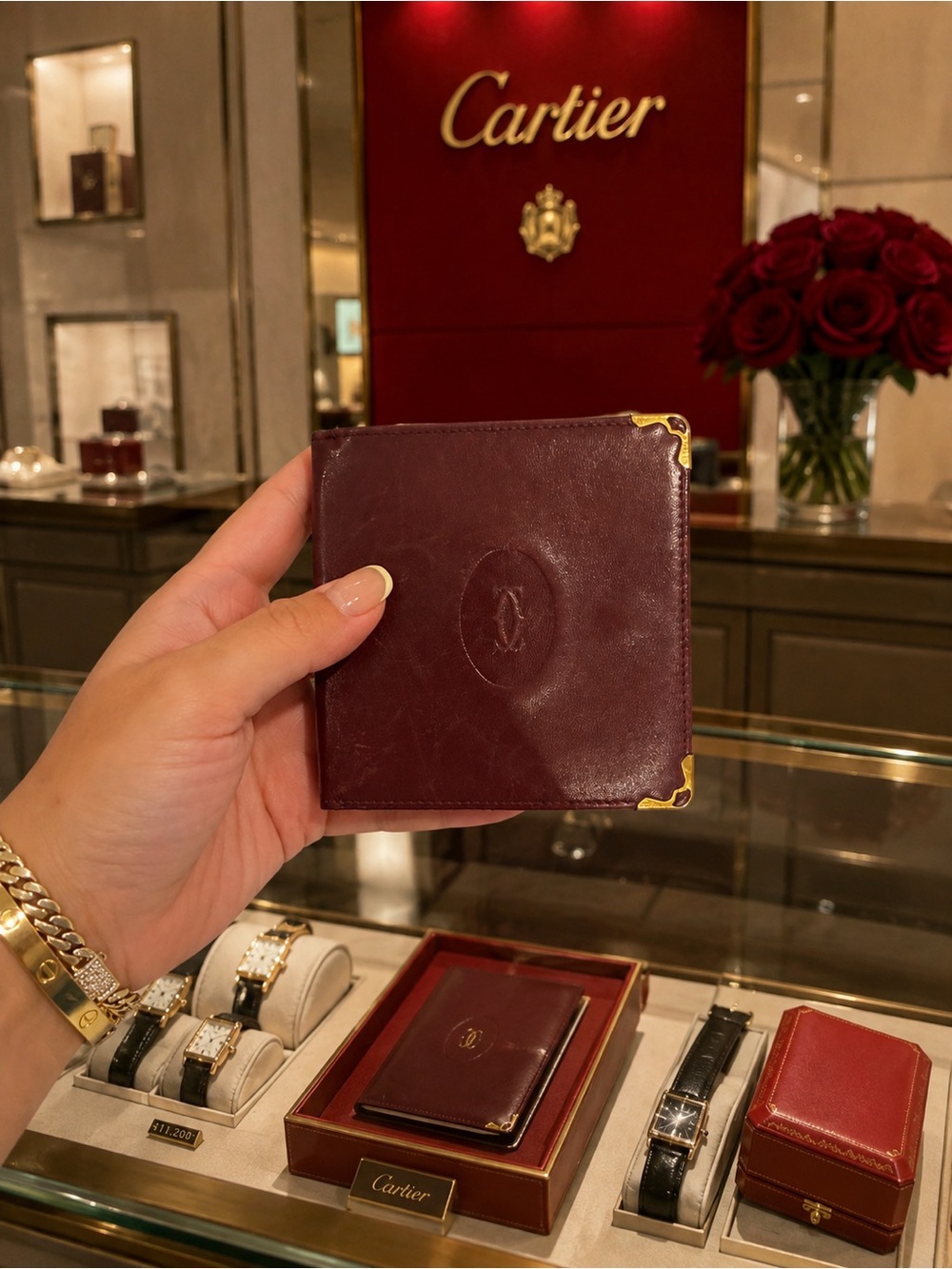 Cartier Burgundy Leather Bifold Wallet with Gold Accents